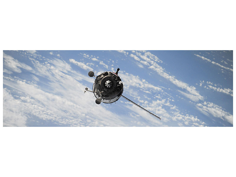 panoramic-canvas-print-a-satellite-above-the-clouds