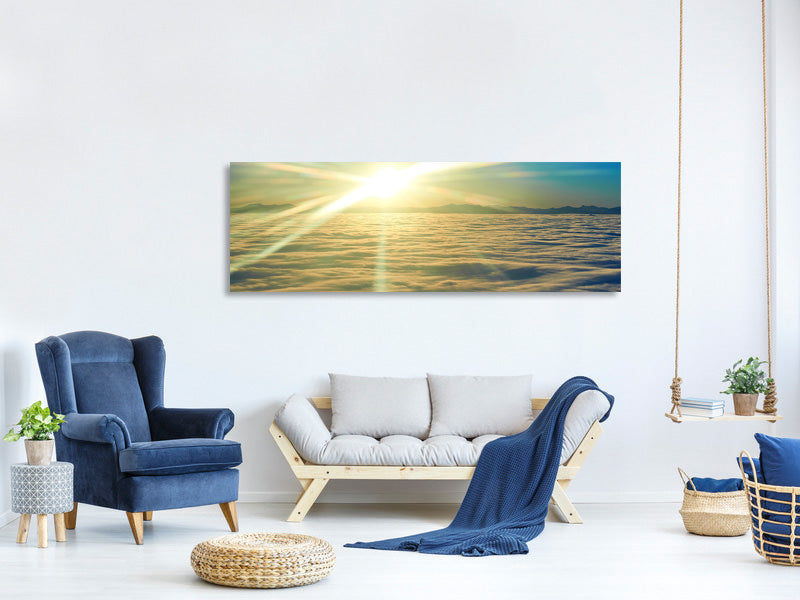 panoramic-canvas-print-sunrise-above-the-clouds